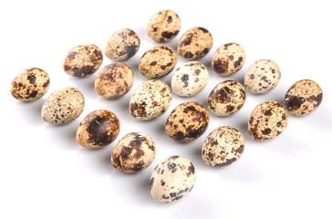 Fototapeta premium Quail eggs over white background 