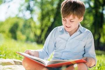 Boy in summer park