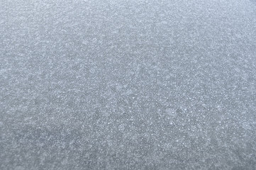 frozen car windshield in winter