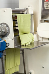 Spaghetti Pasta Sheet Being Processed In Machine