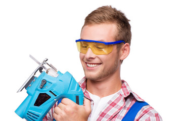 Smiling repairman with tool