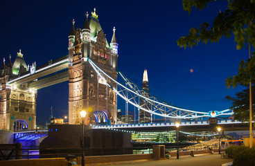 Fototapeta na wymiar Tower bridge in night lights. View from the river Thames