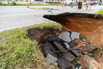 Collapse of the road. Condition of the road to water erosion as