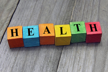 concept of health word on wooden colorful cubes