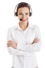 Smiling call center woman with folded arms