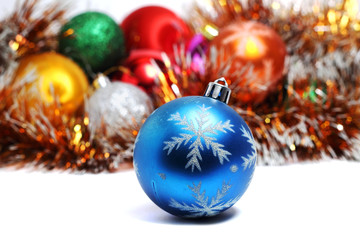 Fototapeta na wymiar Blue ball on Christmas tree on a background of Christmas decorat