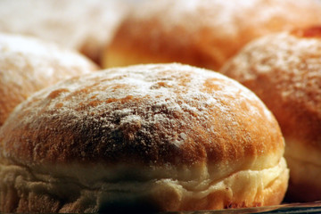 Sweet donuts on plate close up
