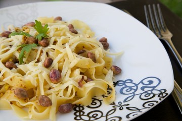 Italian pasta with pistachio pesto and parmesan