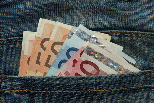 Various Euro notes in Jeans pocket