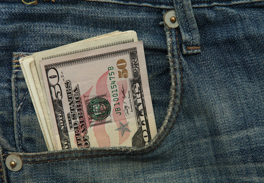 Dollar note in Jeans pocket