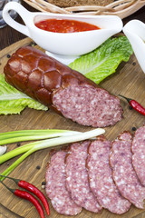 sausage on a wooden plate in a restaurant