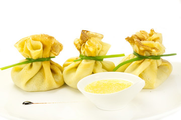 pancakes with meat on a table in a restaurant