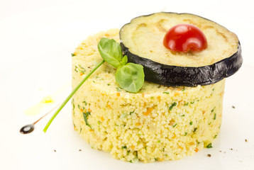 couscous embellished with eggplant and tomato