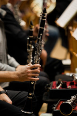 Fototapeta premium Clarinets in the hands of the musicians in the orchestra