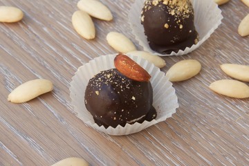 Handmade chocolate truffle with almond nut