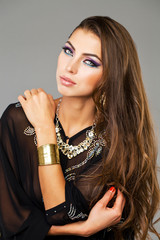 Obraz premium Portrait of the young sexy woman in black tunic Arabic