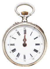 twelve o'clock on the dial of retro pocket watch