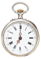 seven o'clock on the dial of retro pocket watch