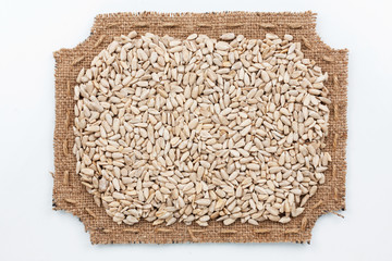 Figured frame of burlap with sunflower  seeds
