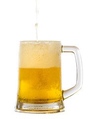 Frosty glass of light beer set isolated on a white background