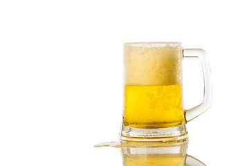 Frosty glass of light beer set isolated on a white background
