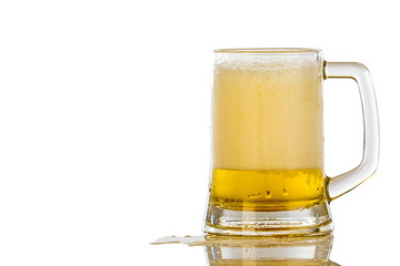 Frosty glass of light beer set isolated on a white background