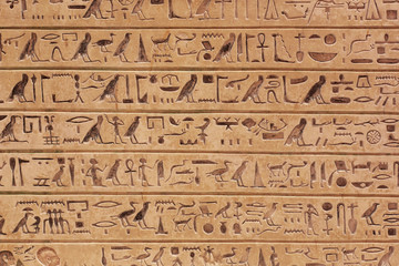 Fototapeta na wymiar Egyptian hieroglyphs stone background