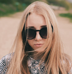 Beautiful girl in sunglasses