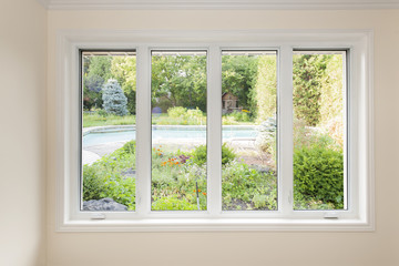 Window with view of summer backyard - obrazy, fototapety, plakaty