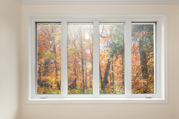 Window with view of autumn forest