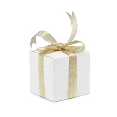 Gift box with golden ribbon bow on white background