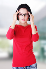 Fototapeta premium Young woman have headache