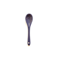 Ceramic spoon isolated on white background