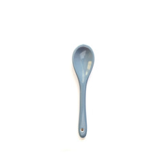 Ceramic spoon isolated on white background
