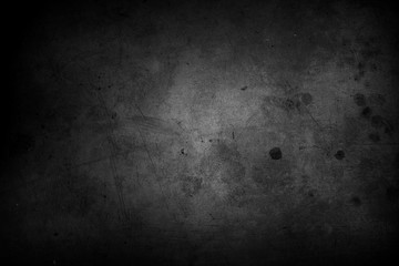 Dark black grunge textured concrete stone wall background