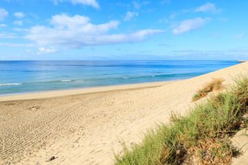 Fototapeta na wymiar Morro Jable beach on coast of Fuerteventura island, Spain