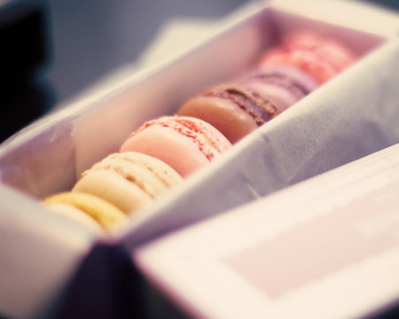 Colorful vintage macaroons in an elegant gift box