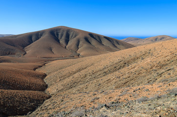Volcanic landscape of Fuertevenura island near Tuineje village