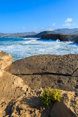 Rocks and ocean wave on La Pared beach, Fuerteventura island