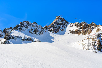 Fototapeta na wymiar Ski slope and lift in Austrian winter resort of Pitztal, Austria