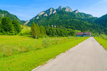 Fototapeta na wymiar Countryside road with view of Trzy Korony, Pieniny Mountains