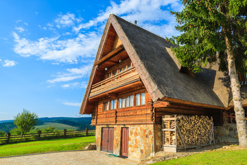 Fototapeta na wymiar Mountain house in Arlamow village, Bieszczady Mountains, Poland