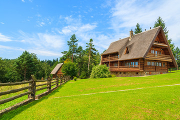 Fototapeta premium Mountain house in Arlamow village, Bieszczady Mountains, Poland