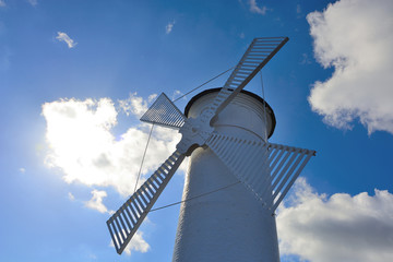 Lighthouse - windmill against the sky - Swinoujscie