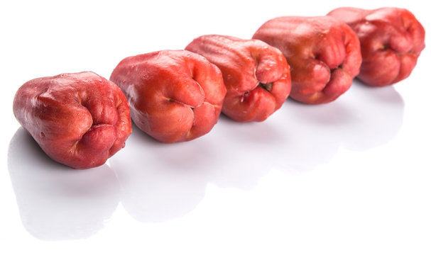 The exotic rose apple fruit over white background
