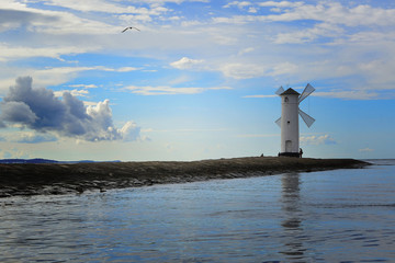 Lighthouse - windmill on the breakwater - Swinoujscie