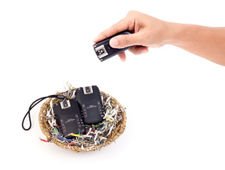 Wireless Flash Trigger in hand, Isolate on white background