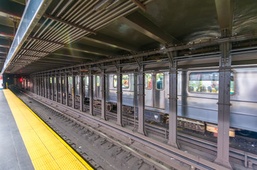 Fast moving train in Manhattan subway - New York transportation