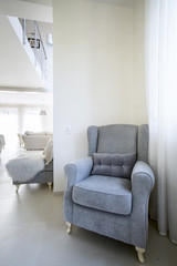 Comfortable armchair standing in the corner