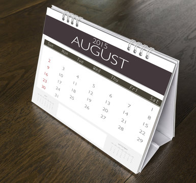 August Calendar 2015 on wood table